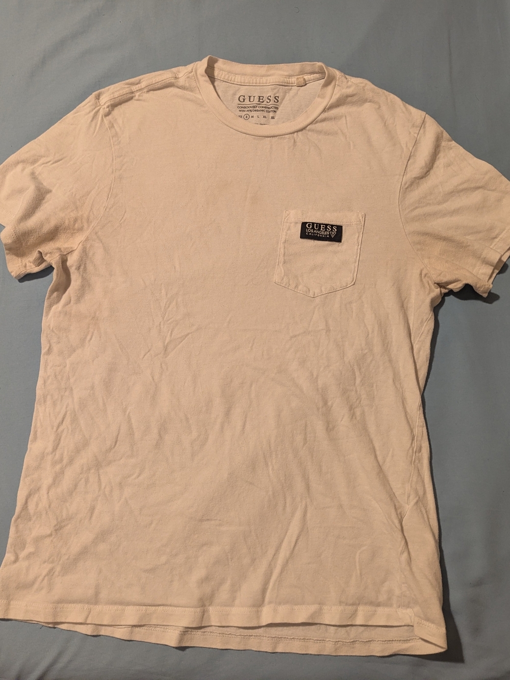 GUESS Men’s Cream Short Sleeve Pocket Tee with Logo Patch